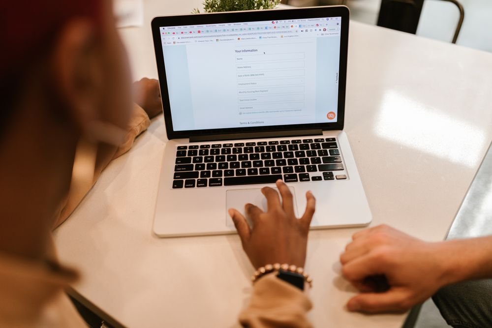 People completing an interactive online form