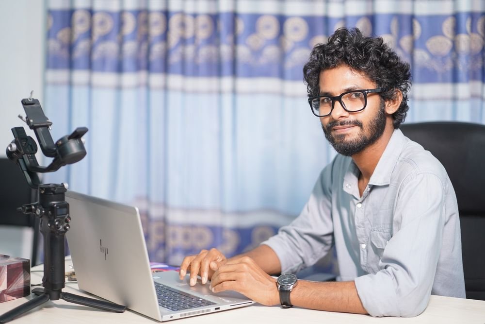 Web designer working at a laptop